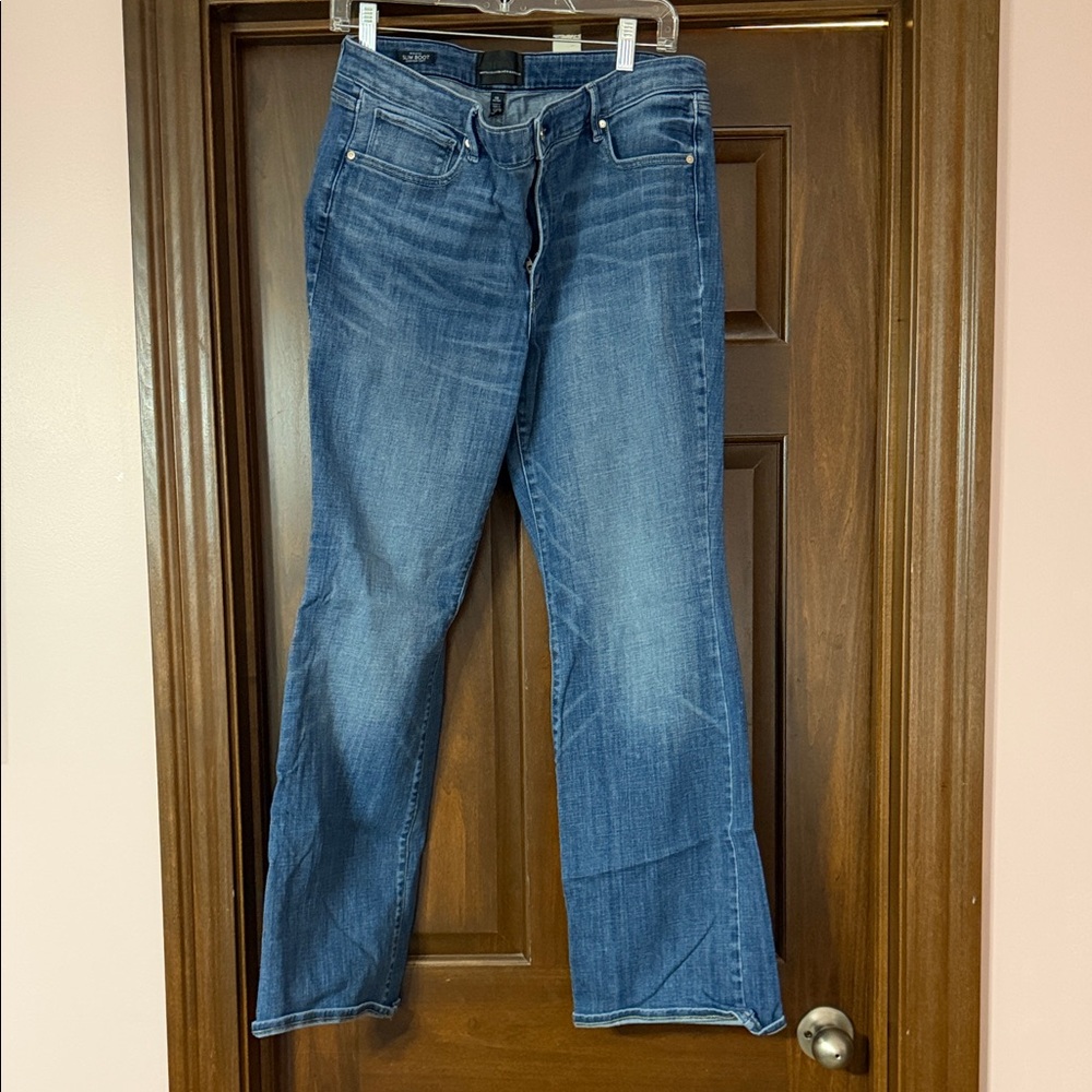 White House Black Market Flare Jeans in Blue